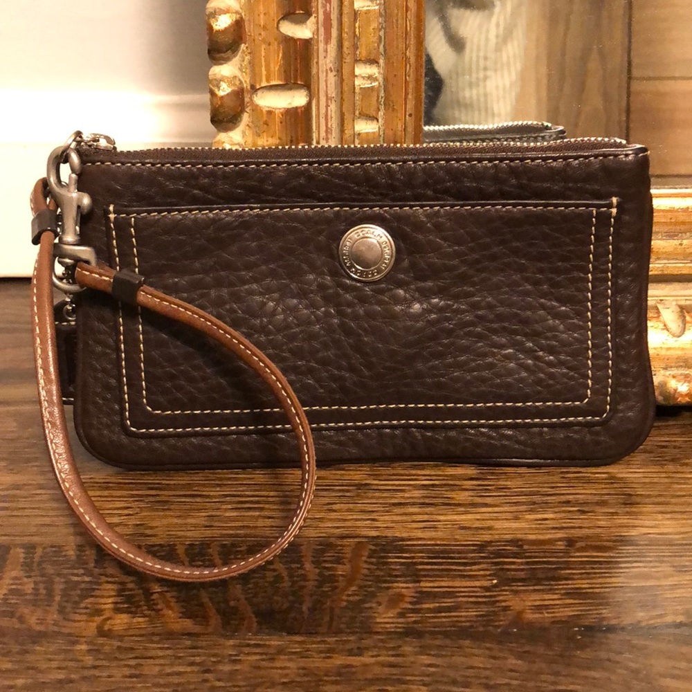 Brown leather coach wristlet